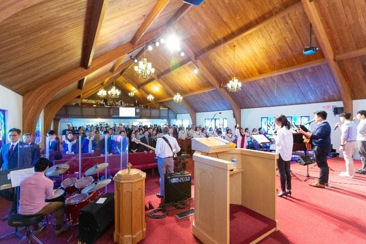 Congregation singing during worship